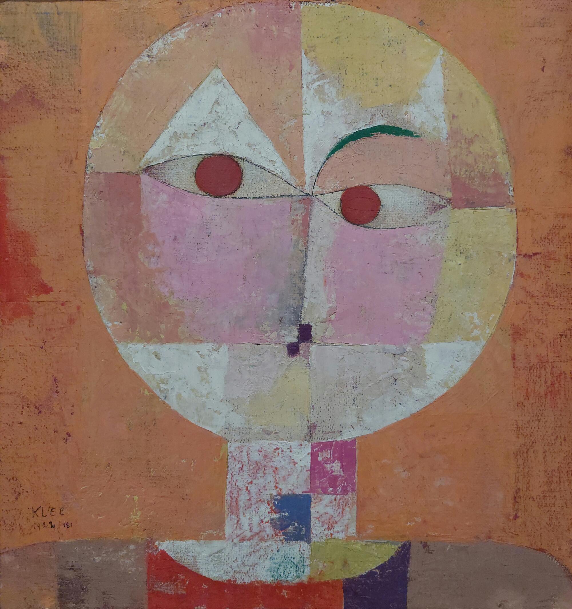 Peinture abstraite représentant un visage stylisé, construit à partir de formes géométriques colorées inscrites dans un cercle sur un fond ocre.