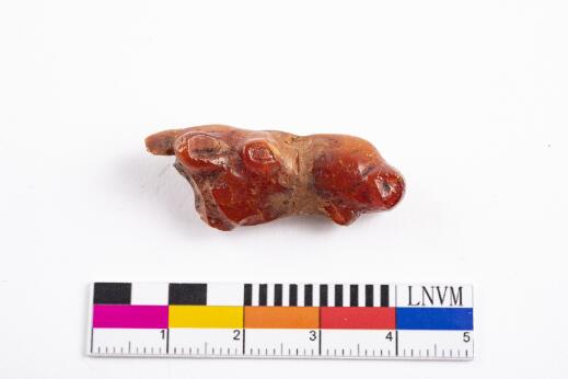 Petit objet sculpté représentant une tête animale